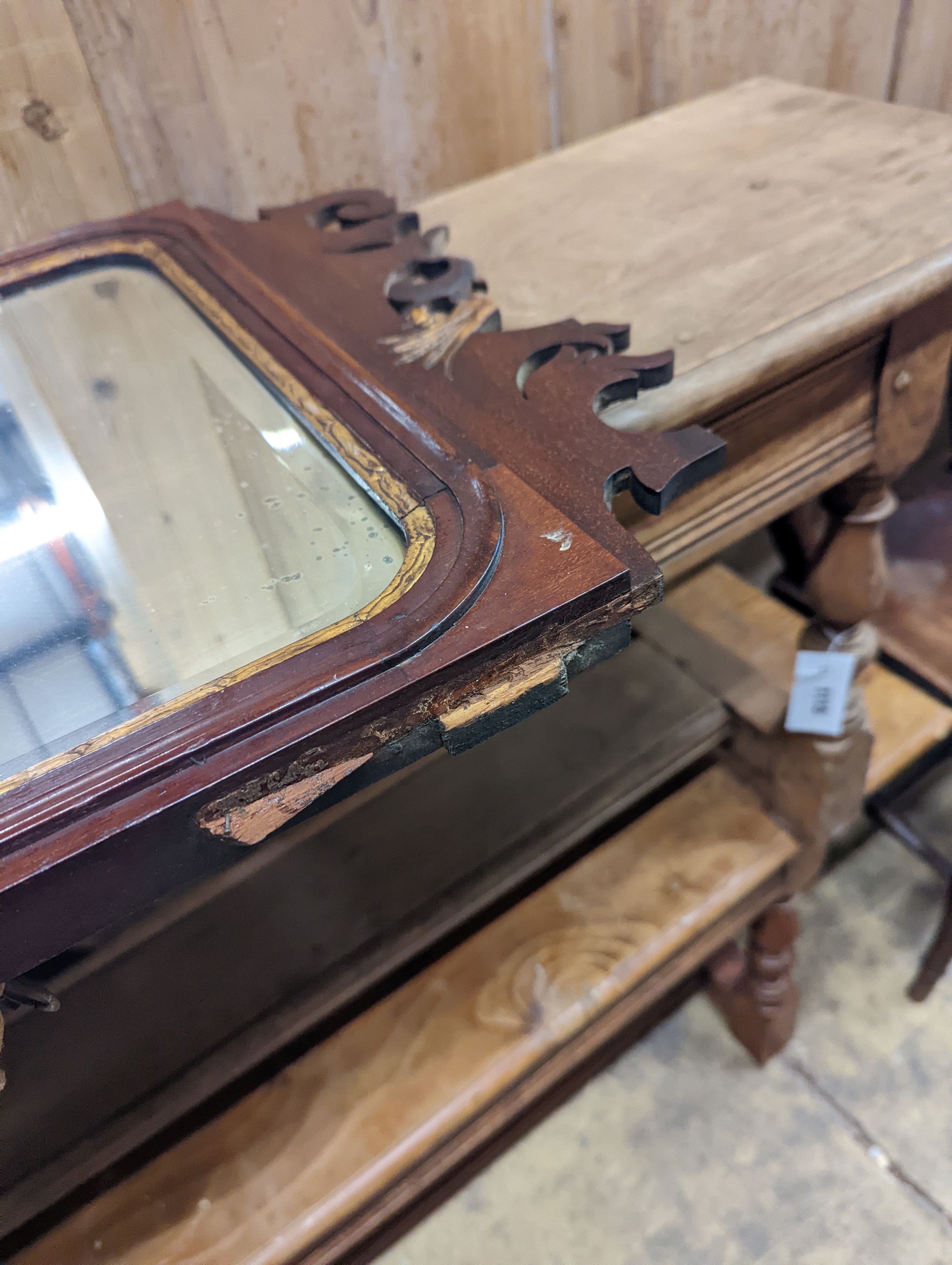 A George III style mahogany fret cut wall mirror in need of restoration, width 52cm, height 83cm